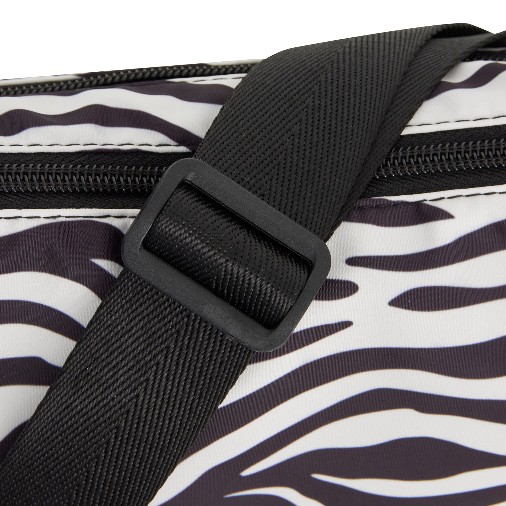 New Rebels Moonbag „Stay Wild" – Crossbody-Tasche mit Zebra-Print, Nylon, 32 × 16 cm