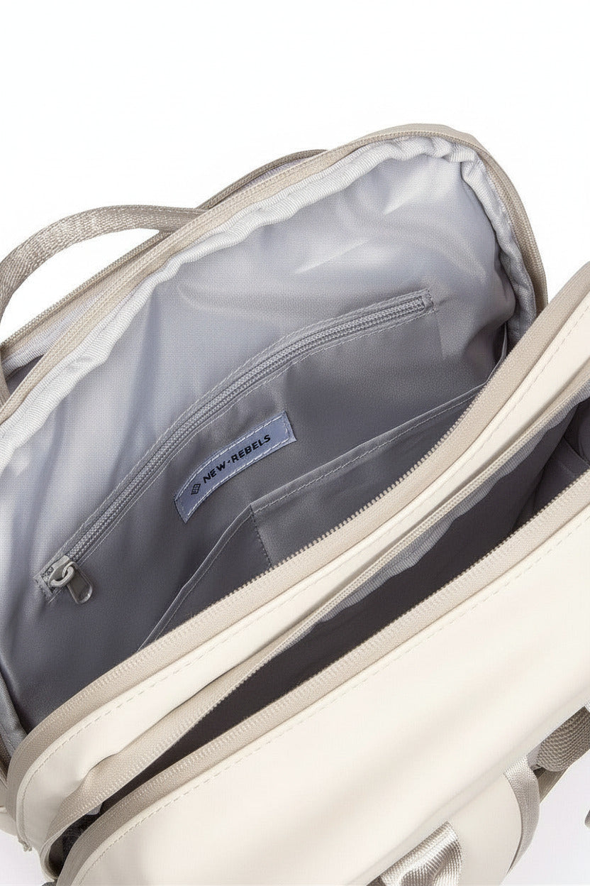 New Rebels William Milwaukee Rucksack – Wasserabweisend, 18L Volumen, Laptopfach, Silber-Innenfutter beige